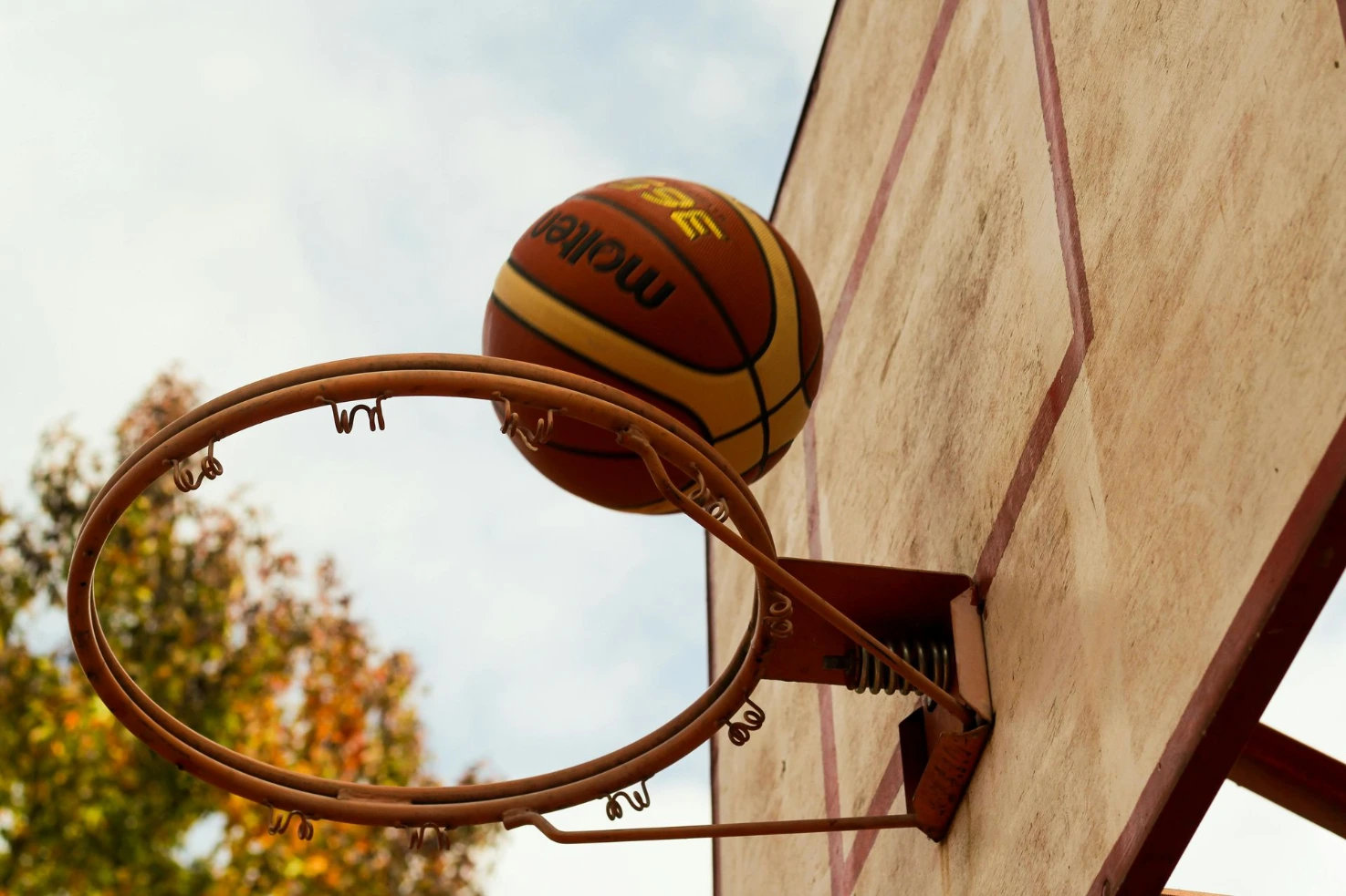 Basketball ring with ball | Image Source: Pexels
